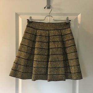 Black and gold skirt with zipper closure